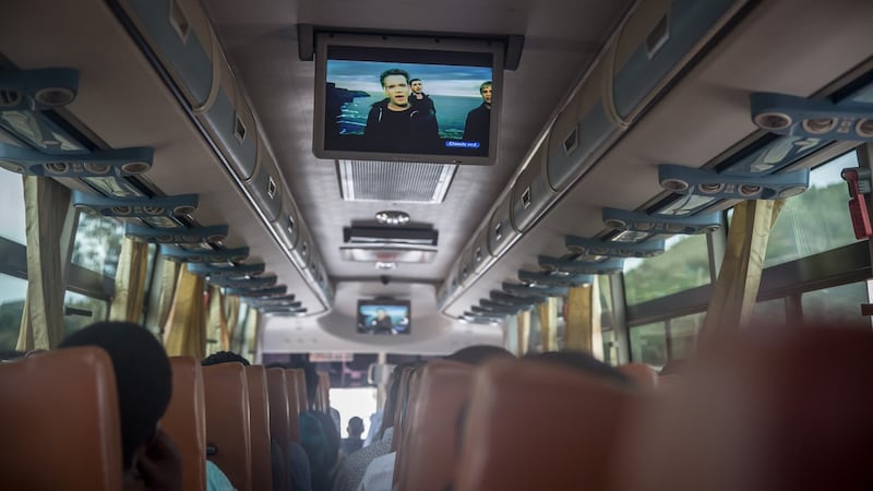 Westlife’s video for ‘My Love’ plays on the bus between Kigali, Rwanda, and Kampala, Uganda, in March 2020. Photograph: Sally Hayden.