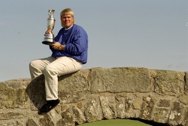 John Daly holds the Claret Jug at St Andrews following his victory in the 1995 British Open. Photograph: Jon  Cuban/Allsport