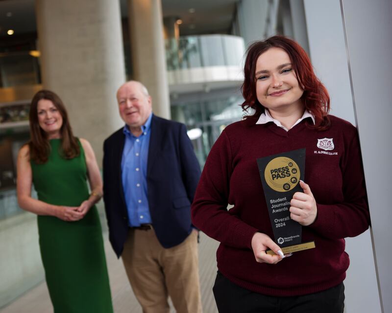 Grace O’Leary, a student from St.Aloysius College, Carrigtwohill, Cork, a winner of last year's Press Pass award for transition year students. Also pictured are Ann-Marie Lenihan, chief executive of NewsBrands Ireland, and Michael Foley, chairman of the Press Pass judging panel.
Photograph: Chris Bellew/Fennell Photography.