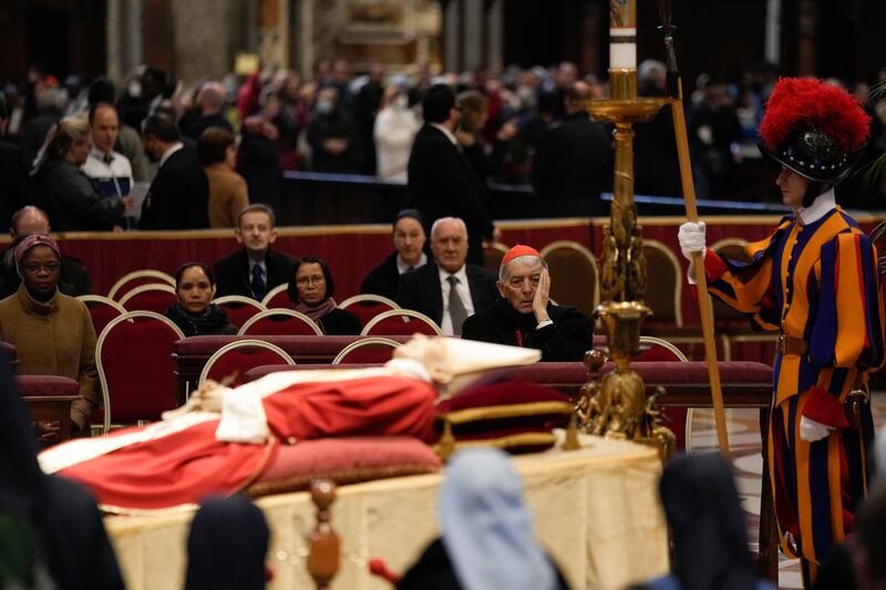 The body of late Pope Emeritus Benedict XVI lies  in state inside St Peter’s Basilica. Photograph: Ben Curtis/AP