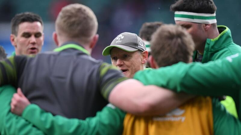 Grand slam: Joe Schmidt gives Ireland a prematch talk at Twickenham. Photograph: Laurence Griffiths/Getty