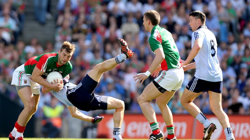 Mayo’s Aidan O’Shea and Barry Moran with Eamon Fennell and Denis Bastick of Dublin. Photograph: James Crombie/Inpho