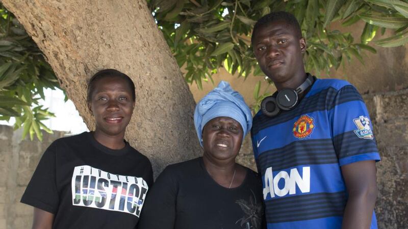 Isatou Jammeh, Fatimah Jaiteh and Ebrima Jammeh, estranged relatives of Gambia’s former dictator Yahya Jammeh, in Serrekunda. Photograph: Lorraine Mallinder