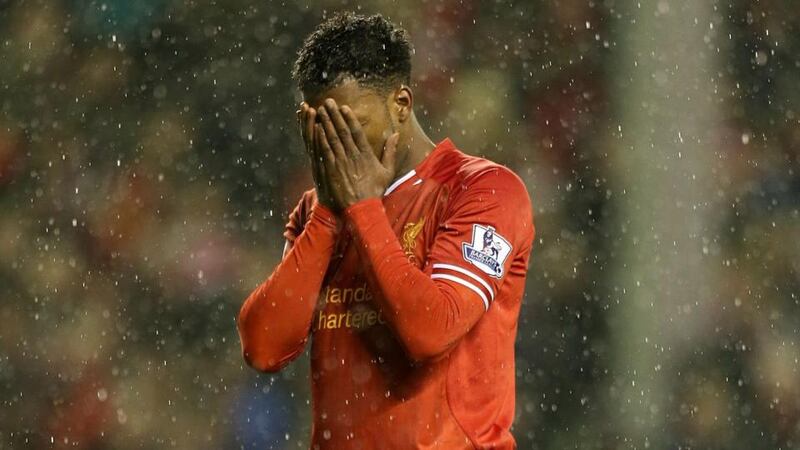 Liverpool’s Daniel Sturridge stands dejected after missing a penalty for his hat-trick.  Photograph: Peter Byrne/PA Wire