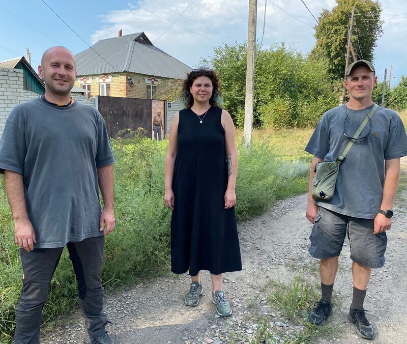 Ukrainians Vlad Sharapa, Kseniia Kalmus and Ihor Okuniev: 'If you replace the roof, people can live in their house and the rest follows.' Photograph: Lara Marlowe