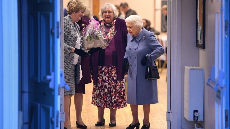 Queen Elizabeth II (R) leaves after attending a Sandringham Women’s Institute meeting at West Newton Village Hall, Norfolk. Photograph: Joe Giddens/PA Wire