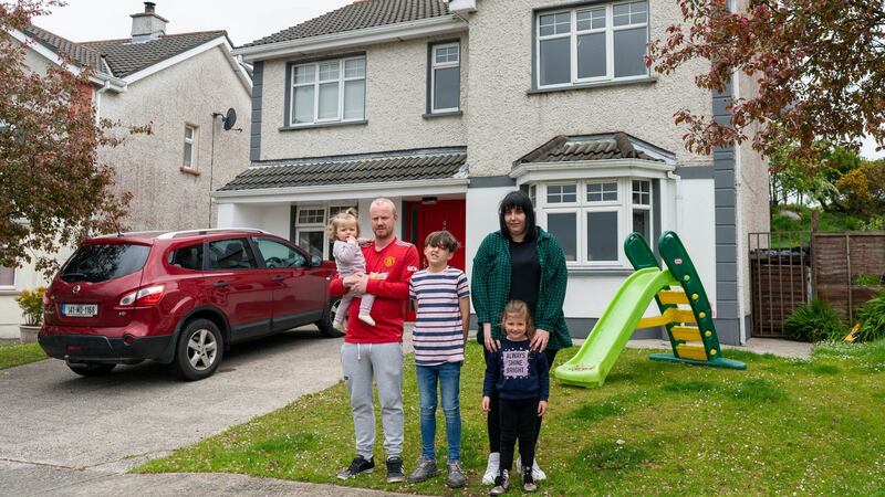 Jamie Lee Donnelly and her husband Ryan McKee with their children Brodie (11), Katie (4), and Annie (1), in front of their home in Ballina, Co. Mayo, which is affected by pyrite and will have to be demolished. Photograph: Keith Heneghan