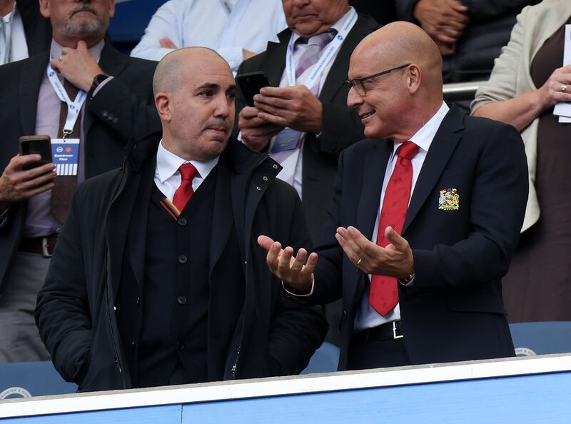 Manchester United chief executive Omar Berrada talks to head of sport for the Ineos group Dave Brailsford. Photograph: Eddie Keogh/Getty Images