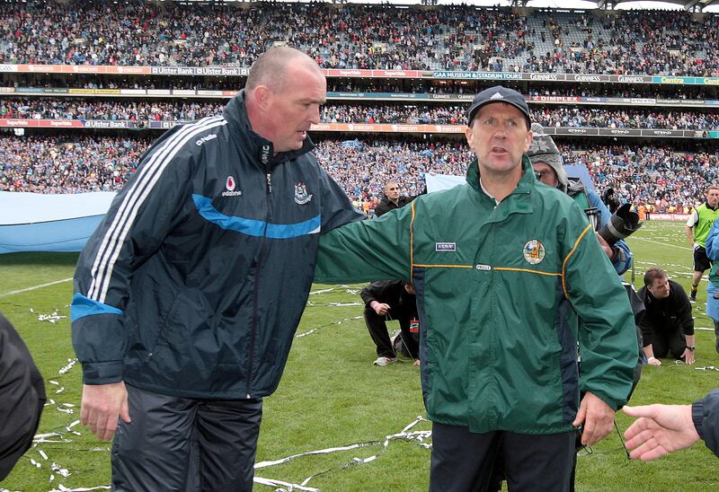 Kerry's Jack O'Connor congratulates Pat Gilroy on winning the All Ireland. Photograph: Morgan Treacy/Inpho