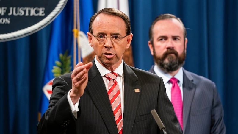 US deputy attorney general Rod Rosenstein announces that the justice department is indicting 12 Russian military officers for hacking Democratic emails. Photograph: Jim Lo Scalzo/EPA