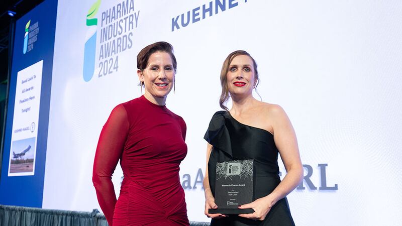 Maura O'Hea, managing director at Next Generation, presents the women in pharma award to Aoife Callan, Takeda Ireland