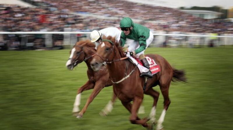 New Approach crosses the finish line to win the 2008 Derby Festival at Epsom Downs race course. File photograph: Getty Images