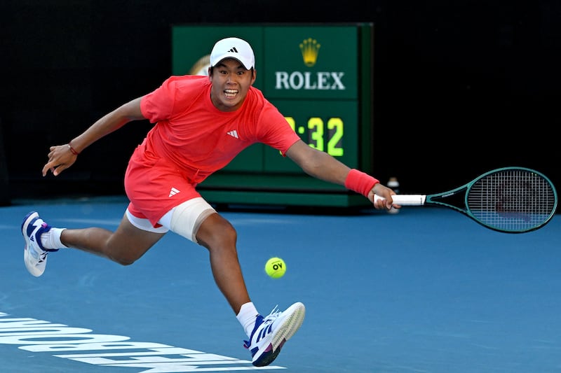 Learner Tien hits a return against France's Corentin Moutet. Photograph: Paul Crock/Getty