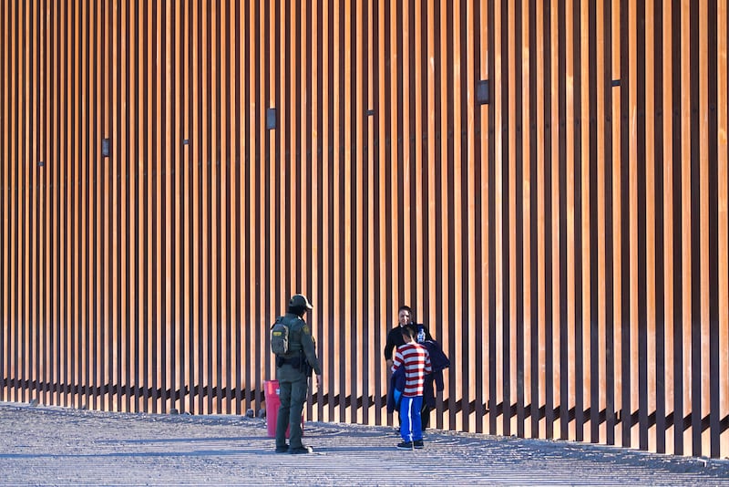 Madeline and her 11-year-old son are detained at the US/Mexico border by US border patrol. Madeline hopes to escape the cartels in Mexcio for a new life in America. Photograph: Enda O'Dowd