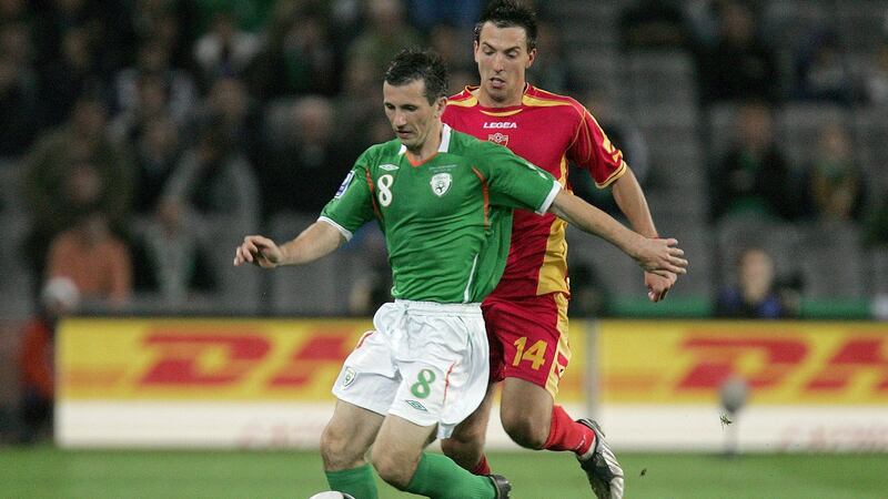 Ireland’s Liam Miller challenged by Dejan Damjanovic of Montenegro during a World Cup qualifier in 2009. Photograph: Morgan Treacy/Inpho