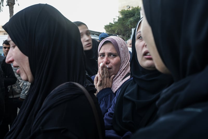 Palestinians mourn their dead at Deir Al Balah hospital after an Israeli air strike on Wednesday. Photograph: Mohammed Saber/EPA