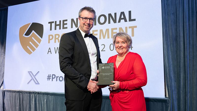 Yvonne Delaney, awards judge, presents the best private sector procurement project of the year to John Herlihy, McKesson Ireland