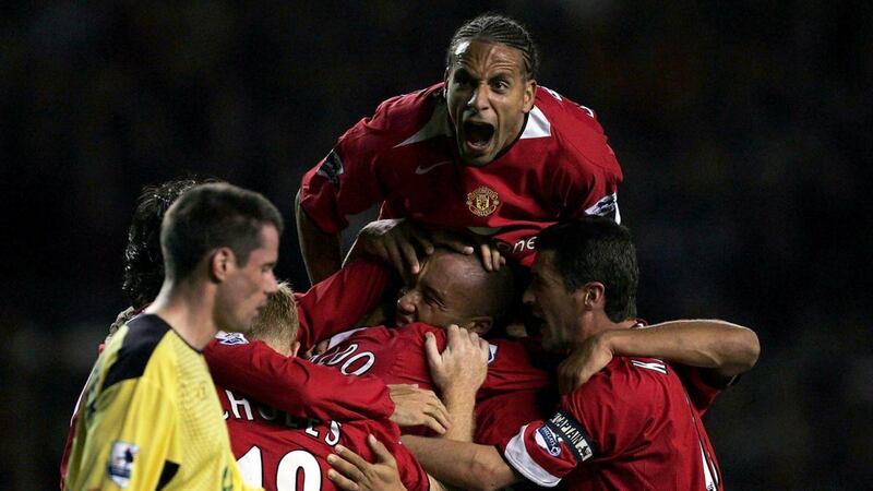 Rio Ferdinand of Manchester United and team-mates jumping on goalscorer Mikael Silvestre during a league game against Liverpool in 2004. Photograph: Getty Images