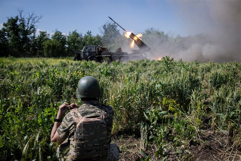 Members of a Ukrainian brigade use a rocket launcher to fire at Russian positions in the Donetsk region of eastern Ukraine last month. Photograph: Tyler Hicks/New York Times
                      