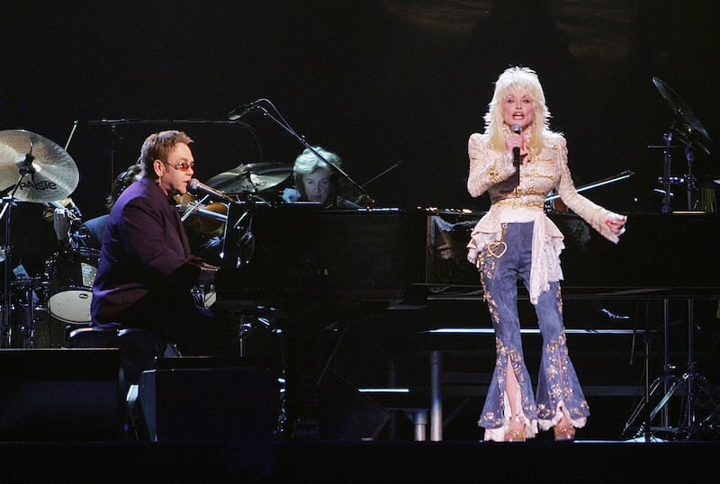 Elton John and Dolly Parton performing at the 39th Annual Country Music Association Awards at Madison Square Garden in 2005. Photograph: Scott Gries/Getty Images