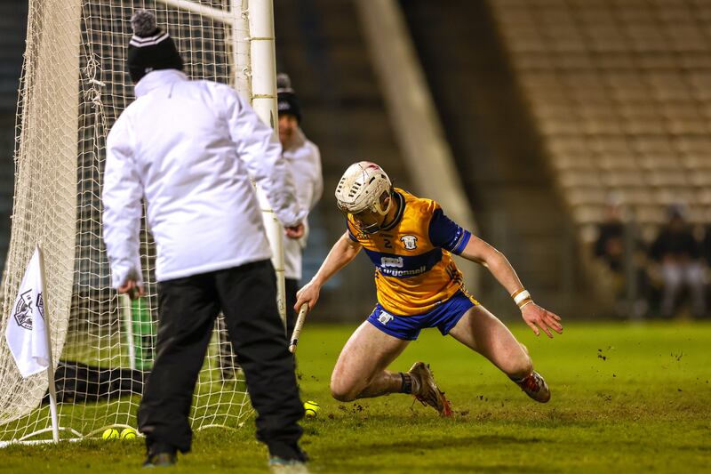 Clare's Adam Hogan of Clare stops the ball from going over the line. Photograph: Natasha Barton/Inpho 