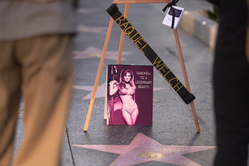 Flowers placed on the Raquel Welch star on the Hollywood Walk of Fame in Los Angeles, California after her death. Photograph: Allison Dinner/EPA-EFE