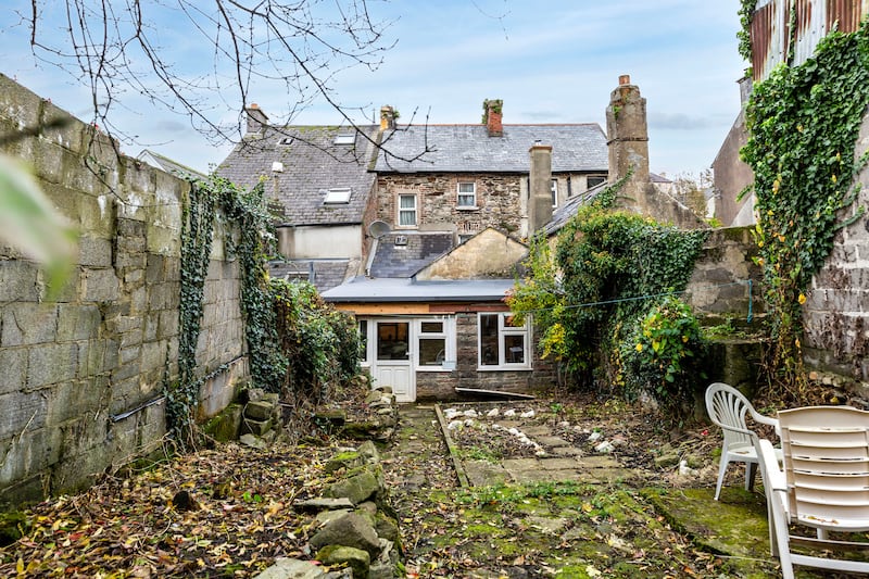 The back garden of the townhouse is substantial and south-facing