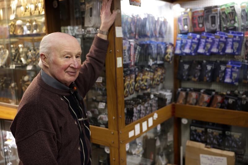 Fergus O'Brien, owner of Brenfer Trophies on Dublin's Capel Street, has seen how the 'Luke Littler effect' has fuelled interest in darts. Photograph: Chris Maddaloni