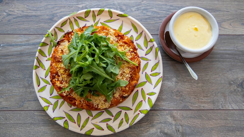 Baked pasta cake with rocket and Parmesan cream. Photograph: Patrick Browne