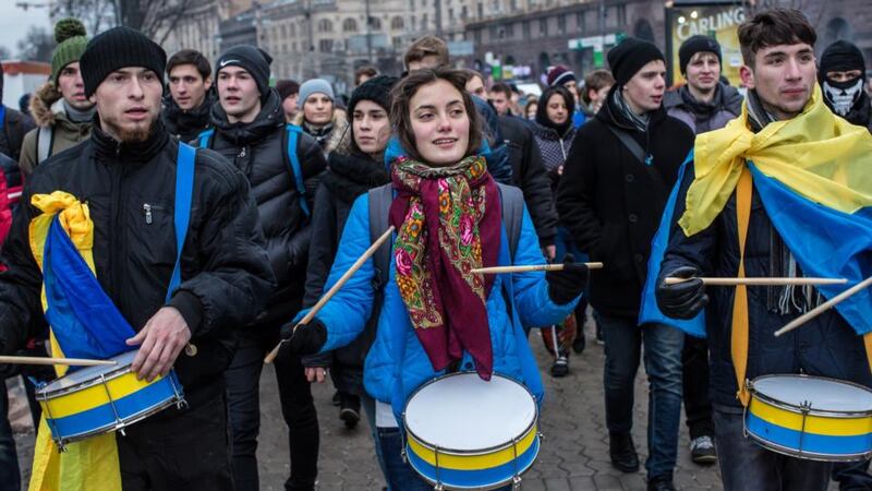 Students march to Independence Square in Kiev on Thursday in favour of tighter European integration. Photograph: Brendan Hoffman/Getty Images