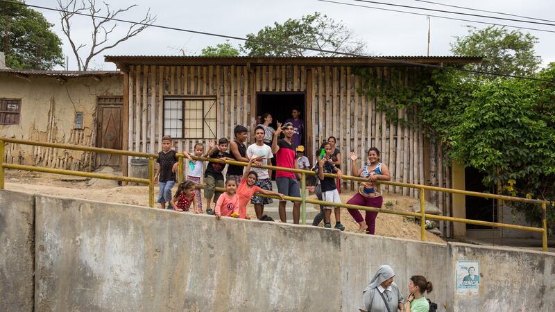 Mother Sophia speaks to reporter Sorcha Pollak outside the refuge that she created for Venezuelan migrants and refugees in the village of Corrales in Tumbes, Peru. Photograph: Paul Musiol