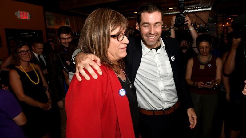 Vermont Democratic Party gubernatorial primary candidate Christine Hallquist, a transgender woman, attends her election night party with her campaign manager Cameron Russell in Burlington, Vermont, on Tuesday. Photograph: Caleb Kenna/Reuters