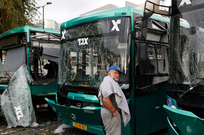 Buses damaged by rockets in the northern Israeli border town of Kiryat Shmona. Photograph: Jalaa Marey/AFP via Getty Images