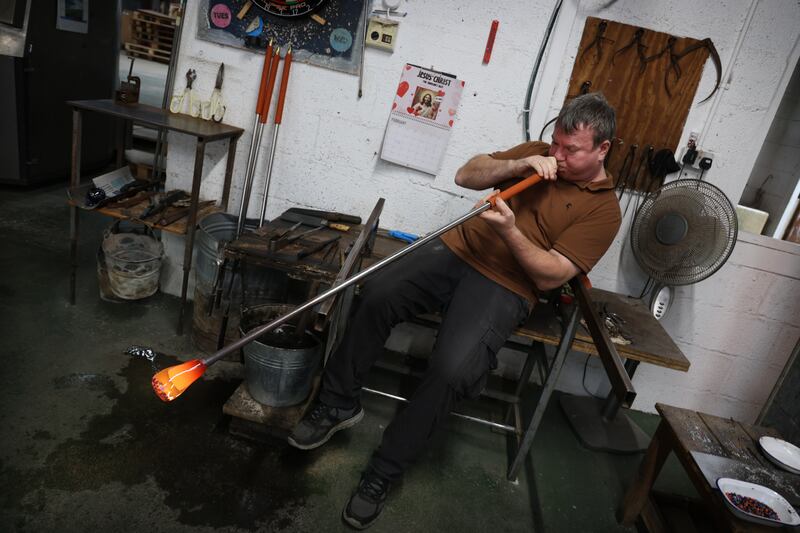 Johnny Maher blowing glass at Jerpoint Glass Studio in Co Kilkenny. 