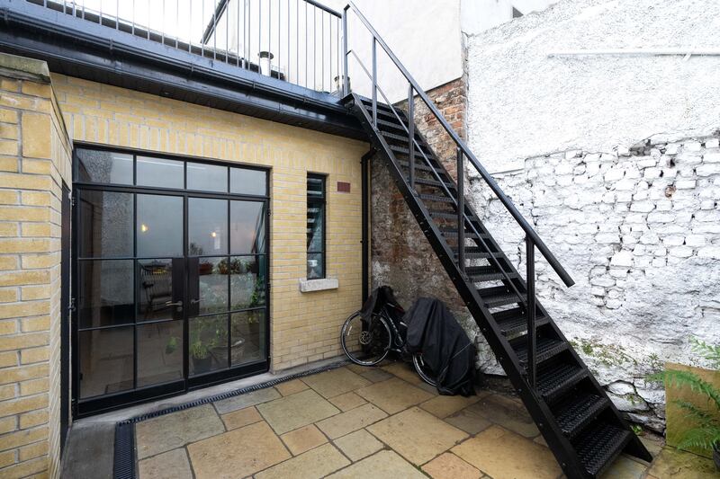 Courtyard and access to roof terrace