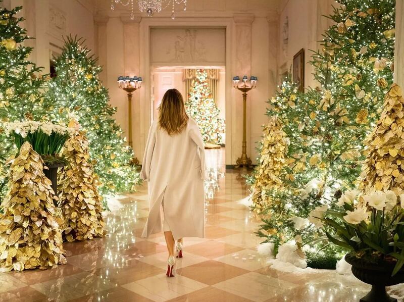 An all-white house: Melania Trump previews this year’s Christmas decorations. Photograph: Andrea Hanks/White House