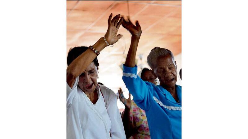 Women praying at Mass in the Alta Grace Church in the Delmas area of Port-au-Prince. Photograph: Brenda Fitzsimons