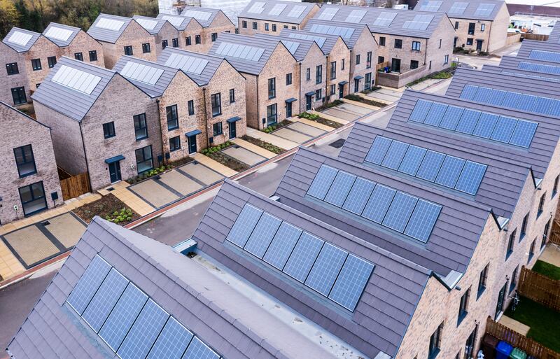 Rooftop solar panels on homes are helping to meet growing demand for electricity. Photograph: Getty