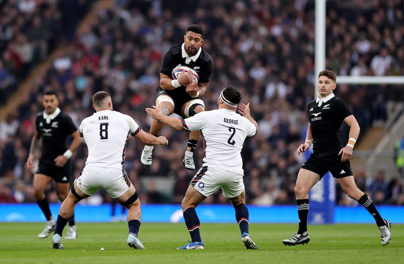 Ardie Savea catches the ball under pressure from Ben Earl and Jamie George during the All Blacks victory over England at the Allianz Stadium in London. Photograph: David Rogers/Getty Images