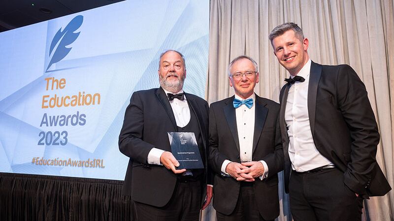 Willie Donnelly, judging co-ordinator, presents the Best Erasmus Programme award to Padraig McGovern and Conor Rafferty, Ó Fiaich Institute of Further Education