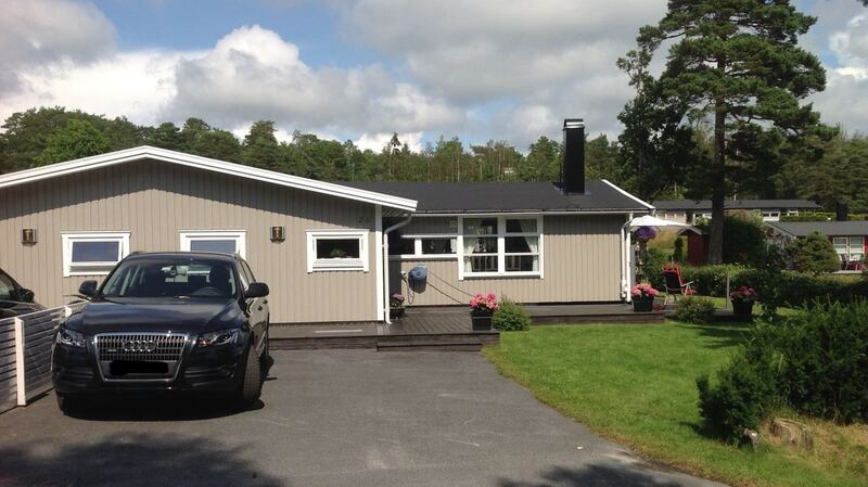 This three-bedroom cottage in Sweden overlooks the links at Stromstad Golf Course.