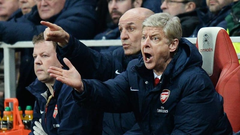 Arsenal manager Arsene Wenger says his side are in the title race. Photograph: Andy Rain/EPA