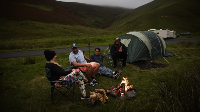 Suzie McGraw, Mat White, Robert McIvor and Alan Popovich at the end of a long day of panning for gold at Mennock Water, a stream near Wanlockhead, Scotland, on September 8th. Photograph: Mary Turner/The New York Times