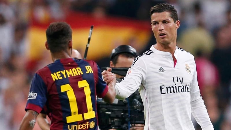 Real Madrid’s Cristiano Ronaldo (right) is favourite to win the Ballon d’Or, while Neymar (left) is one of four Barcelona players nominated.  Photograph: Juan Medina / Reuters