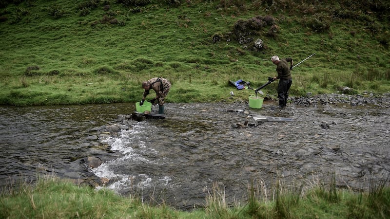 Panning for gold at Mennock Water, a stream near Wanlockhead. Photograph: Mary Turner/The New York Times