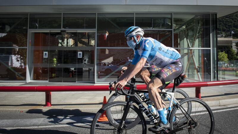 Dan Martin wears a facemask during a training camp in Andorra. Photograph:  Noa Arnon/Israel Cycling Academy