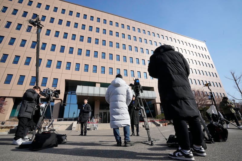 Media members waiting for the arrival of Mr Yoon near the Corruption Investigation Office for High Ranking Officials in Gwacheon. Photograph: Ahn Young-joon/AP