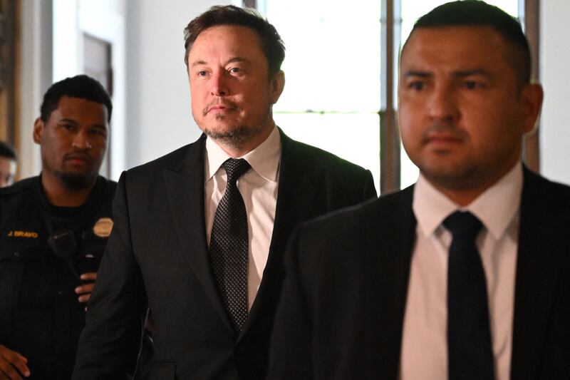 Elon Musk (centre) hired Yaccarino as chief executive after he bought Twitter for $44 billion (€41.2 billion) Photograph: Andrew CABALLERO-REYNOLDS/AFP via Getty Images)