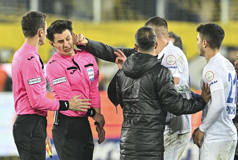 Faruk Koca, President of MKE Ankaragucu throws a punch to the referee Halil Umut Meler after the Turkish Super Lig match in 2023. Photograph: Emin Sansar/Anadolu via Getty