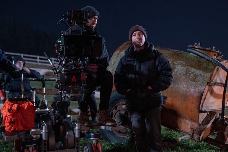 Leigh Whannell (right) on the set of Wolf Man. Photograph: Nicola Dove/Universal